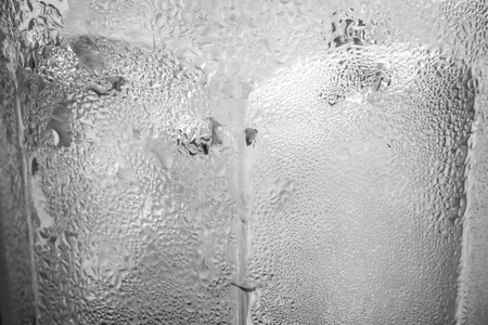 droplets from glass of wather in bw theme. use for background, articles, columm, web design, or other you wantの写真素材
