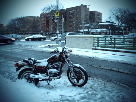 Vintage Motorcycle during the snowの写真素材
