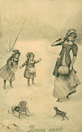 FRANCE - CIRCA 1910: Vintage Christmas postcard with depicts a family in the park, circa 1910. Happy...
