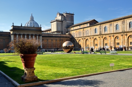 VATICAN - MARCH 10: Interior courtyard of the Pinecone and Sphere at Vatican Museums on Mar 10, 2011. Sphere was created in 1990 by Italian sculptor Arnoldo Pomodoroのeditorial素材
