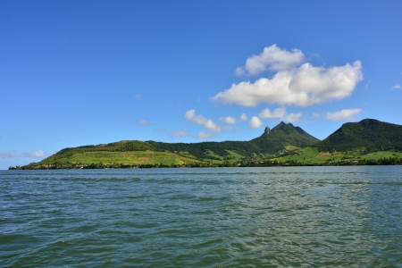 Beautiful coastline of Mauritius Island with mountains on backgroundの写真素材