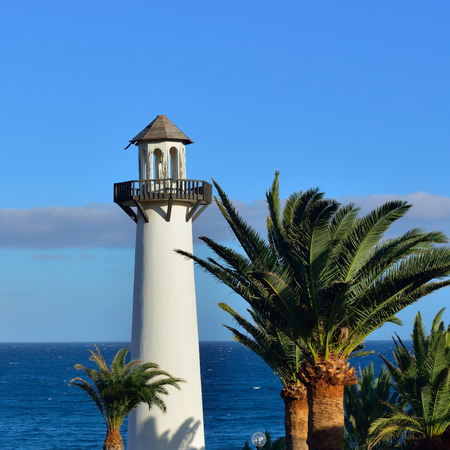 Old lighthouse in front of the atlantic ocean at sunset time  Gran Canaria, Canary island, Spainの写真素材