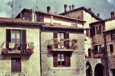Pienza, Italy  Typical medieval archetecture in the small old town in Tuscany  Filtered image in vintage styleの写真素材