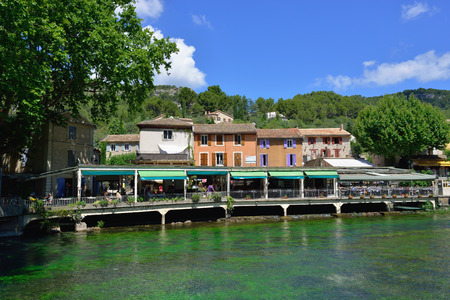 PROVENCE, FRANCE - JUL 8, 2014  Medieval Village Fontaine de Vaucluse on the river shore  The poet Petrarch made it his preferred residence in the 14th centuryのeditorial素材