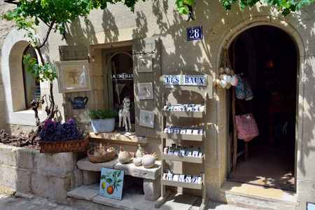 LES BAUX, FRANCE - JUL 9, 2014:Souvenir shop in village of  les Baux. Les Baux is now given over entirely to the tourist trade, relying on a reputation as one of the most picturesque villages in Franceのeditorial素材