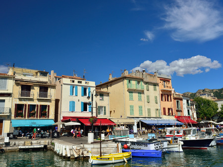 CASSIS, FRANCE - JUL R 14, 2014: A picturesque tourist port in the south of France called Cassis. Cassis is a famous port where tourists charter boats to view the calanques.のeditorial素材