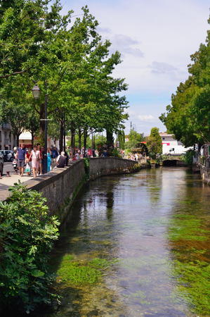 LISLE SUR LA SORGUE, FRANCE - JUL 13, 2014: Beautiful Medieval Village LIsle sur la Sorgue in Provence. The small town is famous for its many antique shops and hosts antique marketsのeditorial素材
