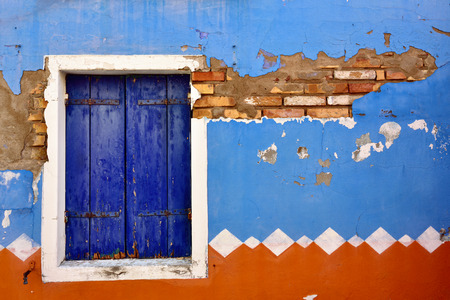 Burano island, Venice. Typical window. Colorful houses island and landmark of Veneto region, Italyの写真素材