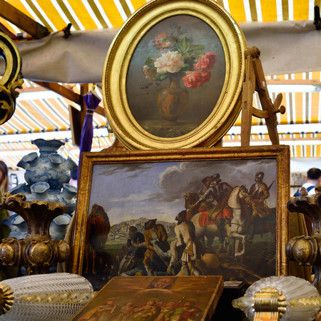 VENICE, ITALY - SEP 21, 2014: Vintage objects, arts, etc for sale at Venice Campo San Maurizio flea...