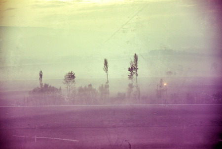 Countryside landscape in the morning fog. Filtered imageの写真素材