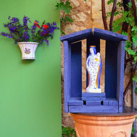 MOUSTIERS SAINTE-MARIE, FRANCE - JUL 18, 2014: Ceramic figurine - Madonna with Child Jesus. Moustiers Sainte-Marie is known all over the world for its ceramics with incomparable refinement and decorsのeditorial素材