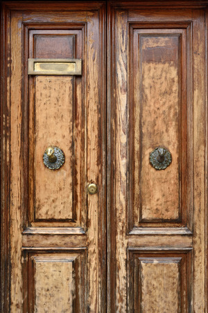 The old woodenl door in Venice, Italyの写真素材