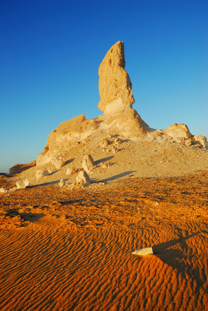 The limestone formation in White Desert at sunset, Sahara, Egyptの写真素材
