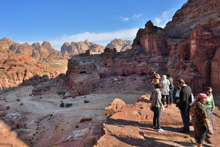 PETRA JORDAN APR February 2015: Tourists visit the Petra at sunrise. Petra UNESCO world heritage site and one of The New 7 Wonders of the World.のeditorial素材