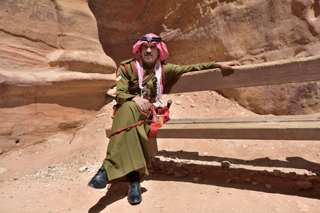 PETRA JORDAN APR January 2015: Jordanian soldier guards Petra Jordan. Petra was originally the capital city of the Nabataeans an ancient Arab civilizationのeditorial素材