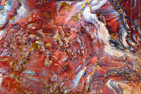 Abstract colorful patterns in sandstone cliff of world wonder Petra, Jordan