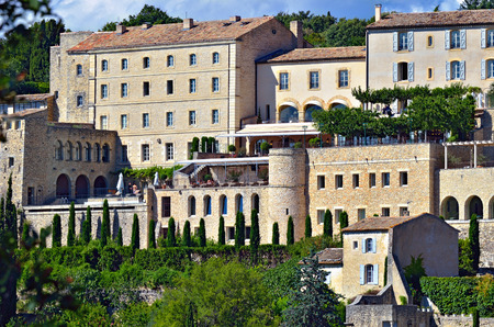 Beautiful Medieval Village of Gordes at evening time, Provence, Franceの写真素材