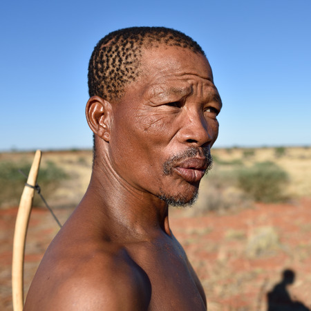 KALAHARI NAMIBIA - JAN 24, 2016: Close-up portrait hunter Bushman. The San people, also known as Bushmen are members of various indigenous hunter-gatherer peoples of Southern Africaのeditorial素材