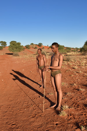 KALAHARI NAMIBIA - JAN 24, 2016: Hunters Bushmen. The San people, also known as Bushmen are members of various indigenous hunter-gatherer peoples of Southern Africaのeditorial素材
