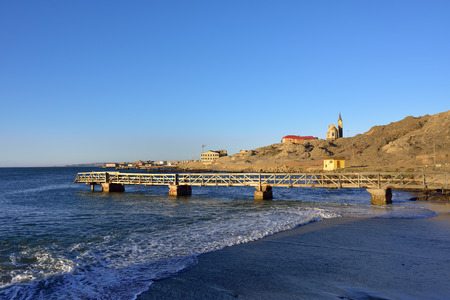 Seafront of the Luderitz at sunset. Luderitz is a harbour town in southwest Namibiaの写真素材