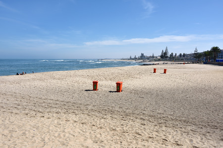 SWAKOPMUND, NAMIBIA - JAN 31, 2016: Public beach on the ocean shore in Swakopmund. Swakopmund was founded in 1892, by Captain Curt von Francois as the main harbour of German South West Africaのeditorial素材