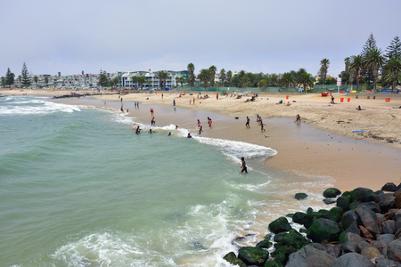 SWAKOPMUND, NAMIBIA - JAN 31, 2016: Public beach on the ocean shore in Swakopmund. Swakopmund was founded in 1892, by Captain Curt von Francois as the main harbour of German South West Africaのeditorial素材
