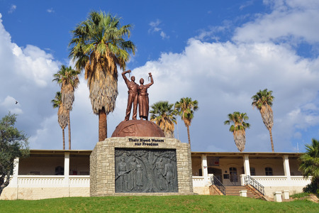 WINDHOEK, NAMIBIA - FEB 5, 2016: Liberation statue in front of the Alte Feste (German colonial fortress) in Windhoek. This monument replaced the Reiterdenkmal (Equestrian Monument) from the German time of Namibiaのeditorial素材