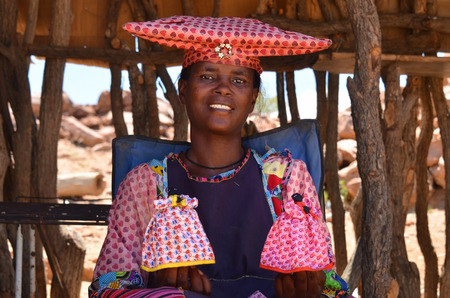 KAOKOLAND, NAMIBIA - FEB 1, 2016: Unidentified Herero Woman in traditional clothes near Opuwo. Namibia. The Herero belonging to the Bantu group, with about 240,000 members alive today.のeditorial素材