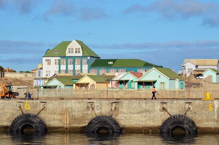 LUDERITZ, NAMIBIA - JAN 26, 2016: Marine research institute of ministry of fisheries in Luderitz shown at sunset, Luderitz is a harbour town in southwest Namibiaのeditorial素材