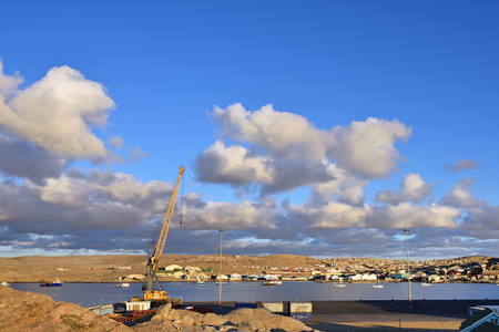 LUDERITZ, NAMIBIA - JAN 26, 2016: Luderitz port at sunset. Luderitz is a harbour town in southwest Namibia, lying on one of the least hospitable coasts in Africaのeditorial素材