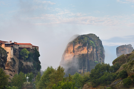 Meteora monasteries and rocks. Beautiful view on the Holy Monastery of Varlaam placed on the edge of...