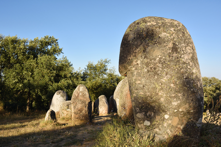 Megalithic culture. Alignment of neolithic stones in Cromeleque dos Almendres,  Alentejo, Evora, Portugalの写真素材