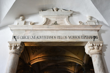 Entrance in Chapel of Bones, is one of the best known monuments in Evora. The message above entrance...