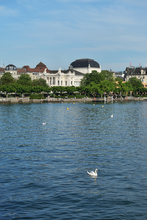 Zurich, Switzerland - June 14, 2017: View from the city of Zurich on the Utoquai quay with the Zurich Opera building (German: Opernhaus Zurich) in the backgroundのeditorial素材