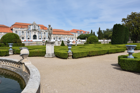 Queluz, Portugal - June 3, 2017. Neptune gardens (baroque) and the facades of the Queluz Royal Palace. Formerly used as the Summer residence by the Portuguese royal familyのeditorial素材