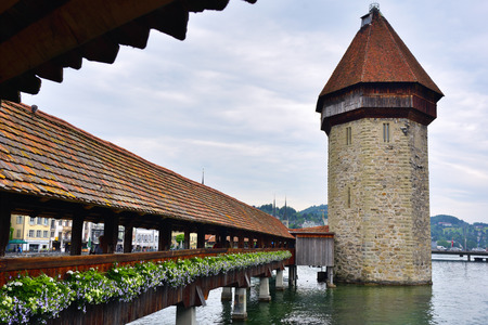 Lucerne, Switzerland - June 14, 2017: Historic city center of Lucerne with Famous Chapel bridge at sunriseのeditorial素材