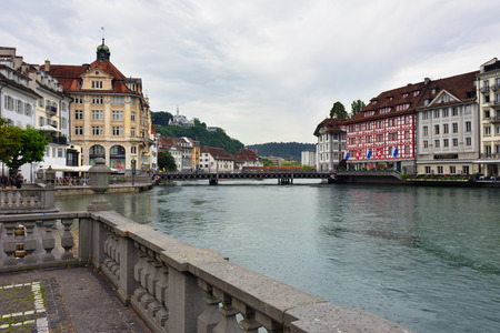 Lucerne, Switzerland - June 14, 2017: Historic city center of Lucerne, promenade and river Reuss shown at early morningのeditorial素材