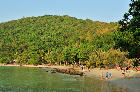 Koh Samet,Thailand - Dec 26, 2011: Tropical sandy beach of Samet island with a lot of tourists relaxing and sunbathingのeditorial素材