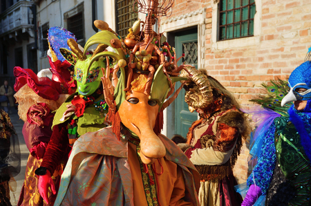 Venice, Italy - March 7, 2011: Unidentified masked persons in costumes on S. Maria Formosa Square during the Carnival of Venice. The 2011 carnival was held from February 26th to March 8thのeditorial素材