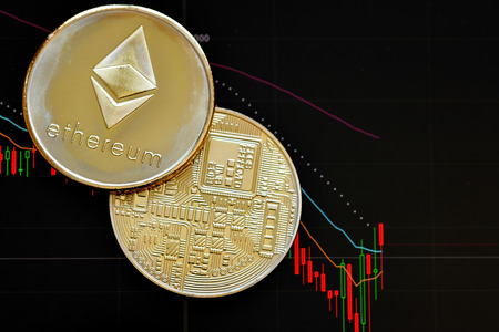 Ethereum. Crypto currency. Ethereum golden coins on a chart on background. Blockchain technologyの写真素材