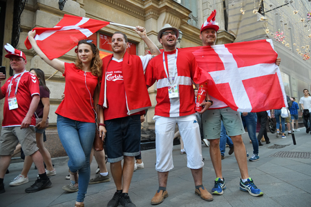 Moscow, Russia - June 26, 2018: Danish football fans on the  streets of Moscow. Soccer fans from abroad walking down the Nikolskaya streets, FIFA world cup, Mundial 2018のeditorial素材