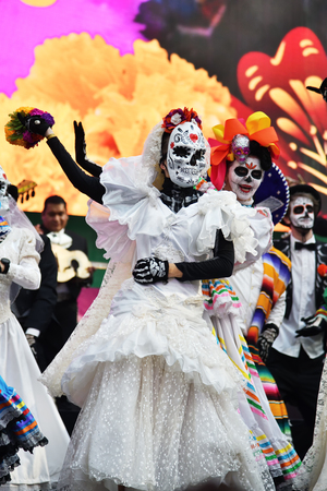 Moscow, Russia - June 29, 2018: Participants in traditional clothing during Dia de los Muertos Mexican carnival. Sugar skull makeup. Day of The Dead paradeのeditorial素材