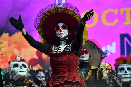 Moscow, Russia - June 29, 2018: Participants in traditional clothing during Dia de los Muertos Mexican carnival. Sugar skull makeup. Day of The Dead paradeのeditorial素材
