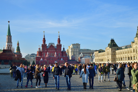 Moscow, Russia - October 14, 2018: People walking along the Red Square, near Kremlin, the State...