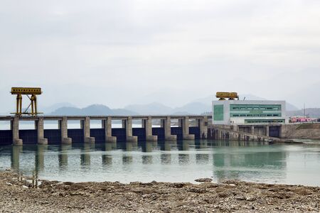 North Korea - April 30, 2019: Hydroelectric power station on the river Taedong shown at dawn. DPRK.のeditorial素材