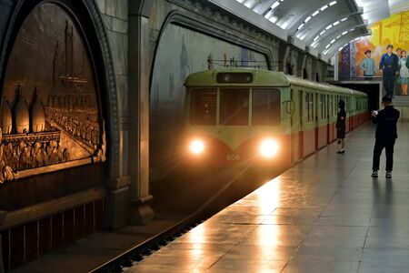 Pyongyang, North Korea - May 1, 2019: Arriving train at the Puhung subway station in Pyongyang Metroのeditorial素材