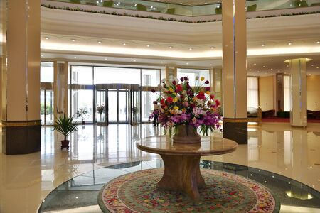Myohyang, North Korea - April 30, 2019: Interiors of the modern Hyangsan Hotel. Hyangsan 5 star hotel is  the countrys best hotel. Built with Stalinist architecture in mind and at 15 stories tallのeditorial素材