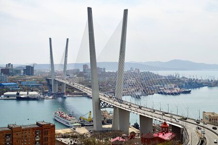 Vladivostok, Russia - April 28 15, 2019: Zolotoy or Golden Bridge cable-stayed bridge in Vladivostok...