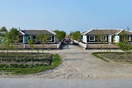Wonsan region, North Korea - May 3, 2019: Typical houses for residents of the countryside. DPRK.のeditorial素材