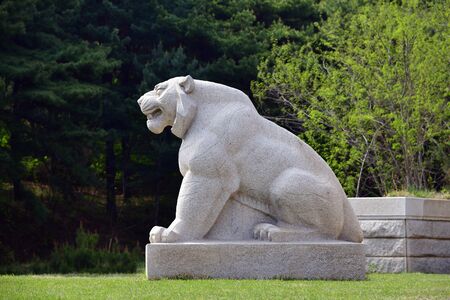 Kaesong, North Korea - May 5, 2019: Granite lion sculpture near Tomb of King Wanggon the founder of the Koryo dynasty. Modern replicaのeditorial素材